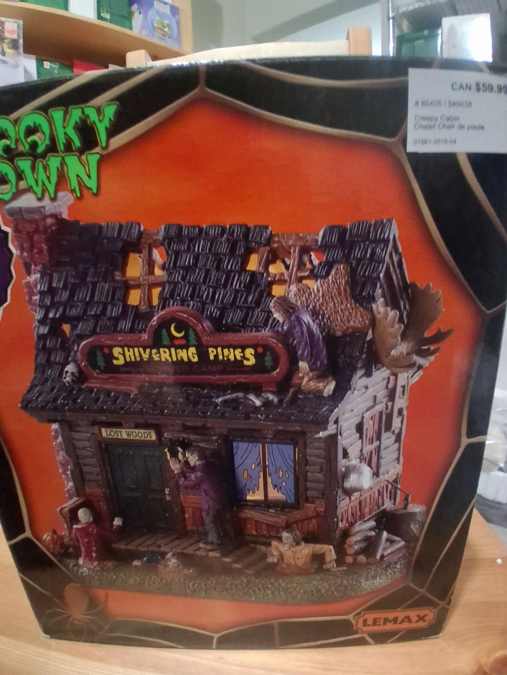 Lemax Shivering Pines Spooky Cottage in Brown and Orange